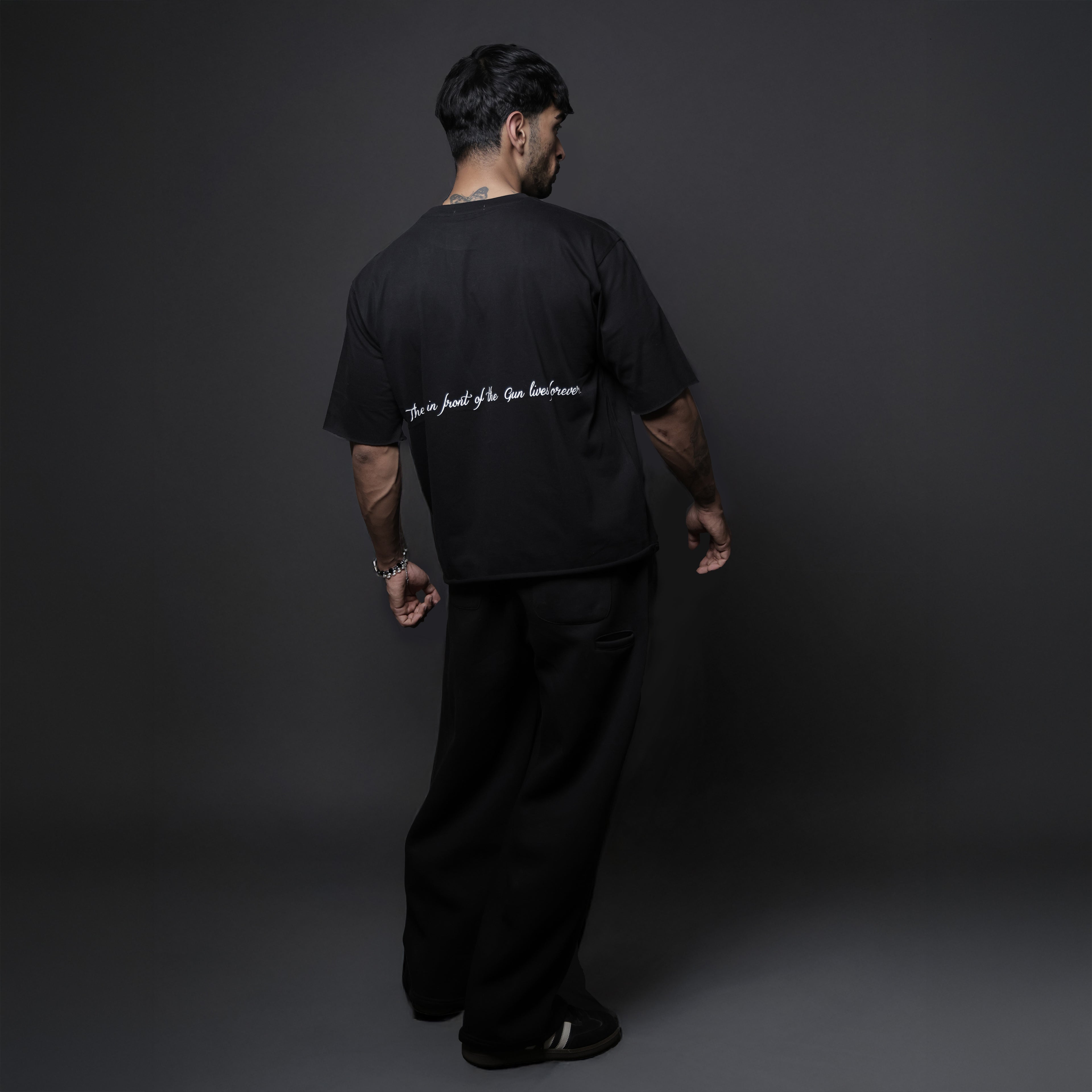 The one in front of the gun